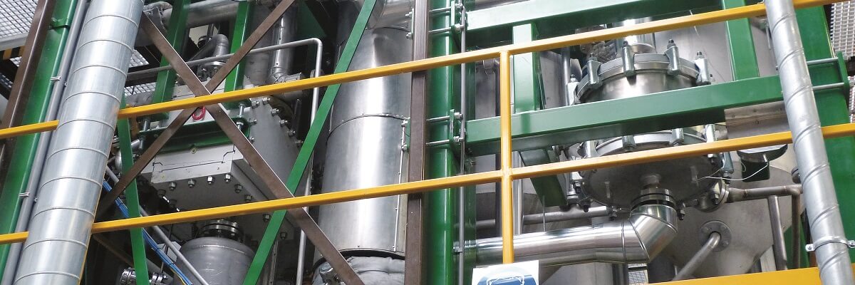 A silver coloured Compabloc installation at a petrochemical plant