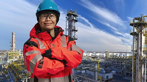 happy asian female oil worker